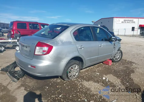 2012 Suzuki Sx4 Le/Le Popular z USA, uszkodzony, nr VIN JS2YC5A37C6302330